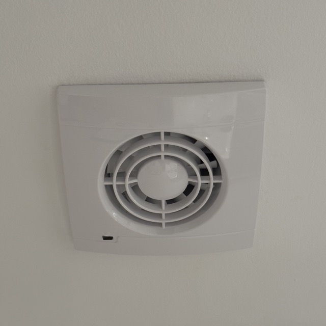 Bathroom fan installation in attic